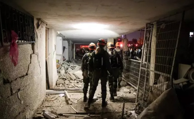 Dozens injured in Israel after Iranian missile strikes target areas near nuclear research centre